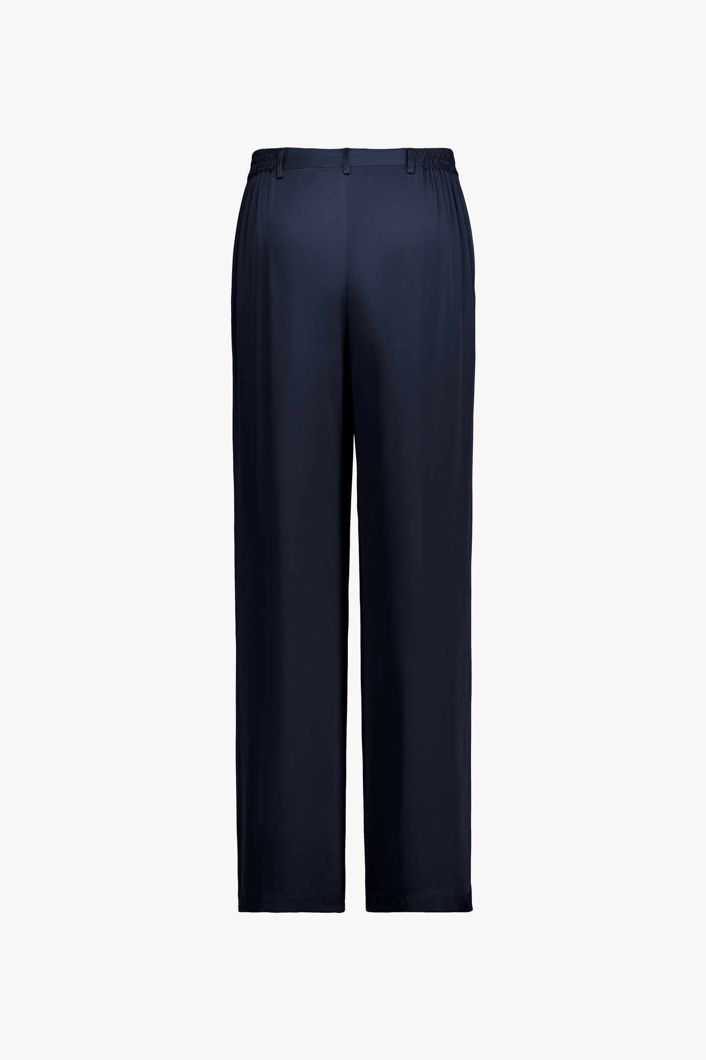 Polyvalent et élégant, ce pantalon droit marine doté d'une ceinture élastique intérieure  et de poches plaquées pour une touche pratique