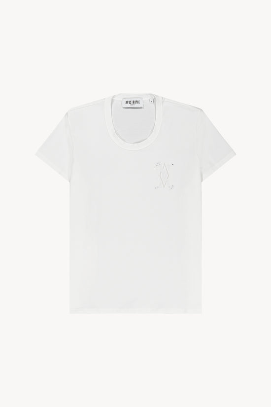 Ce t-shirt blanc optique, avec son col rond et ses manches courtes, est sublimé par une broderie délicate et sa coupe moderne