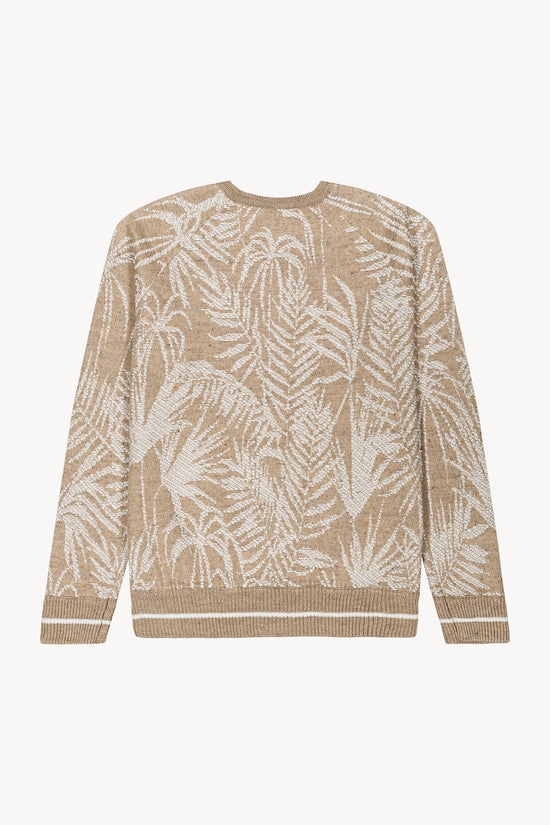 Détail du gilet en lin et coton avec maille fantaisie palmiers, mettant en valeur les finitions côtelées et le design moderne.