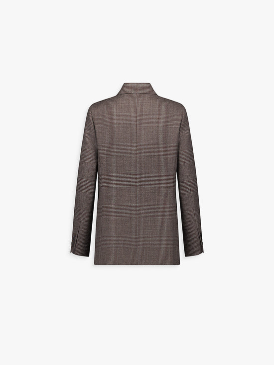 Veste courte en laine vierge coupe droite avec poches plaquées et rabats.