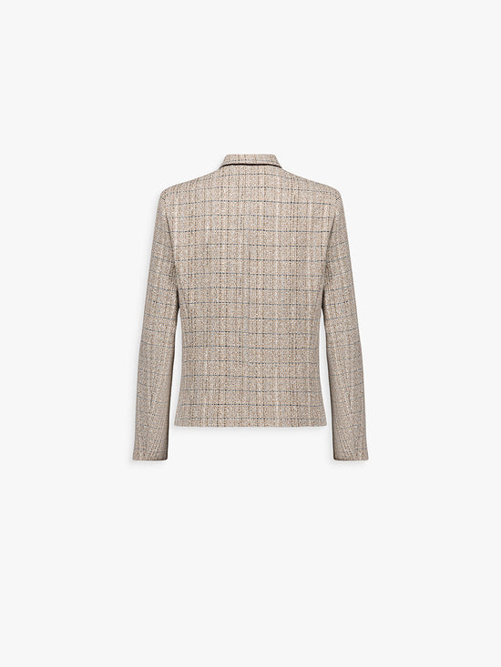 Dos de la veste cintrée marine à fines rayures, coupe ajustée et ligne épurée.