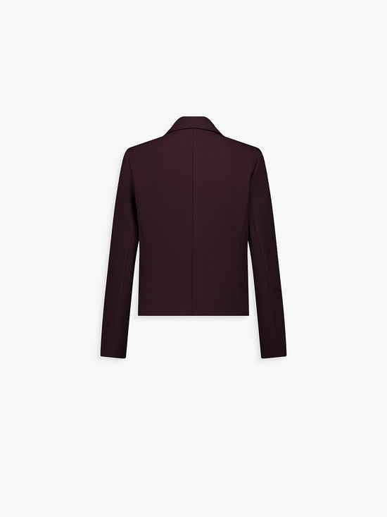 Dos de la veste grenat, coupe droite et tombé structuré.