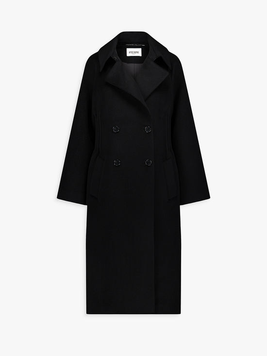 Manteau long noir en laine avec ceinture ton sur ton et poches passepoilées.