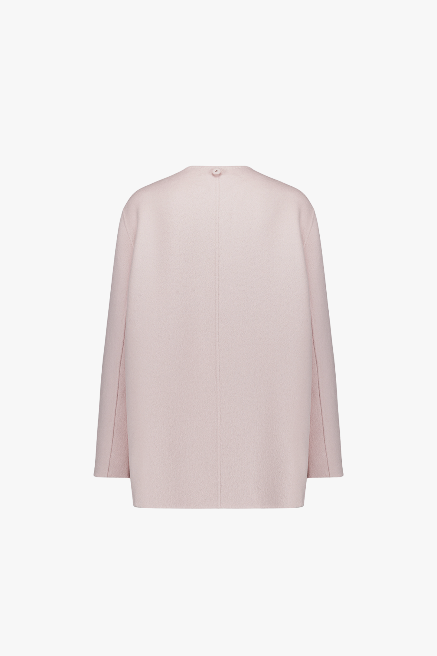 Dos du manteau rose pâle, ligne fluide et épurée.
