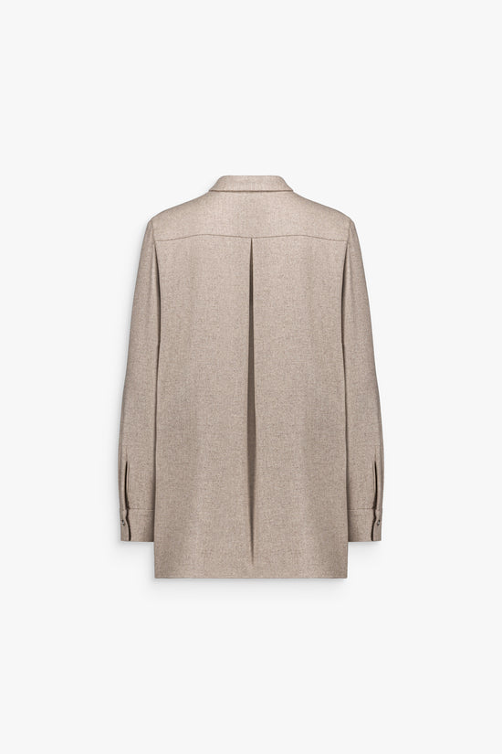 Haut femme en laine et cachemire, texture douce et silhouette épurée.