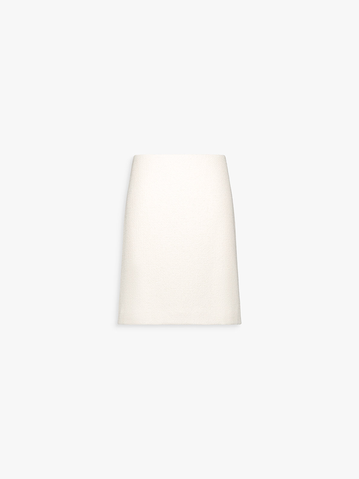 Jupe droite en tweed blanc cassé, ligne structurée et élégante.