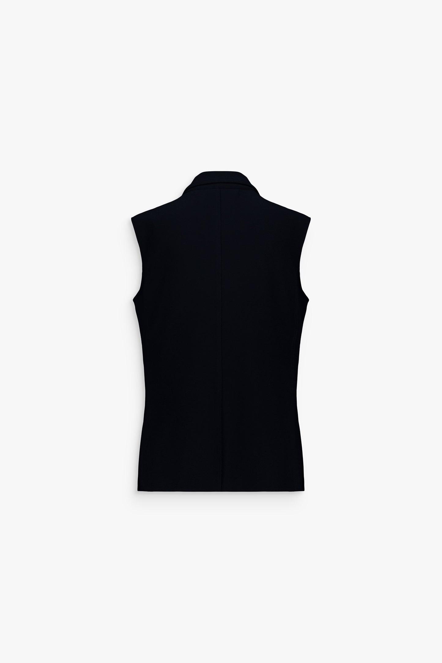 Gilet à revers en pointe, tissu de qualité et allure chic et structurée.