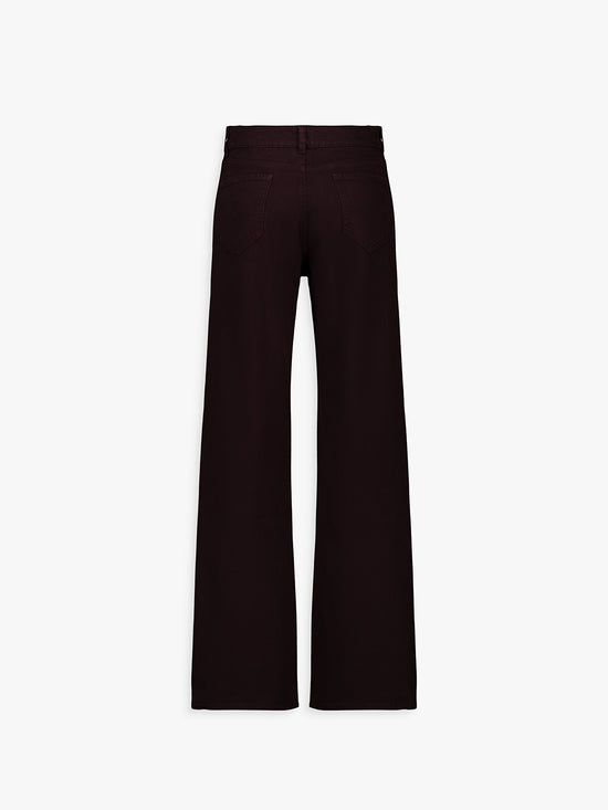 Dos du manteau noir, coupe droite et tombé structuré.