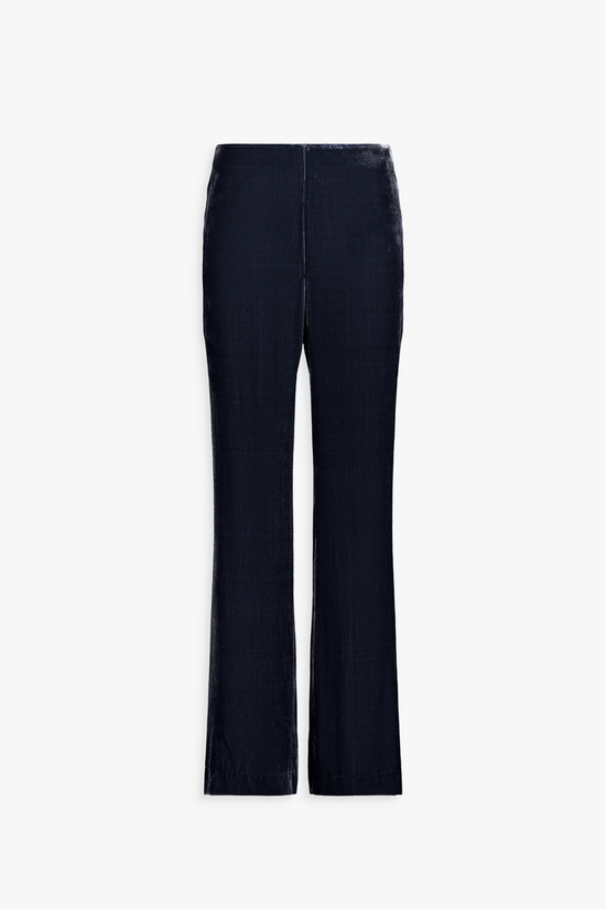Dos du pantalon velours marine, coupe longue et tombé élégant.