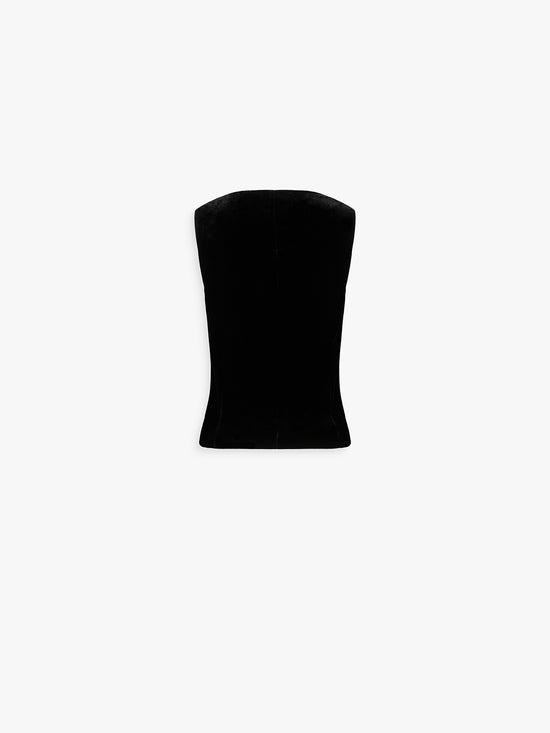 Dos du gilet noir en velours, ligne droite et finitions soignées.
