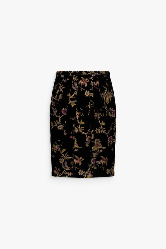 Jupe en velours de soie fluide avec motif floral et volant délicat sur le devant.
