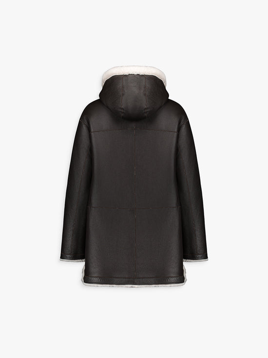Manteau réversible en cuir, style luxueux et chaud pour varier les looks de saison.
