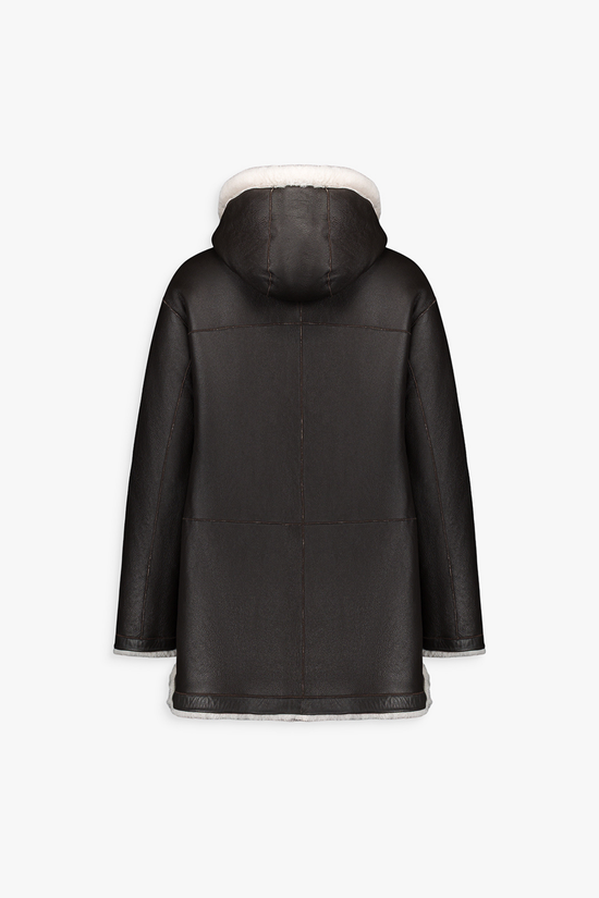 Manteau réversible en cuir, style luxueux et chaud pour varier les looks de saison.