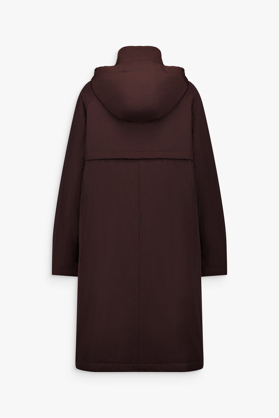 Fourrure réversible avec gilet intérieur amovible, col raglan et zip caché.