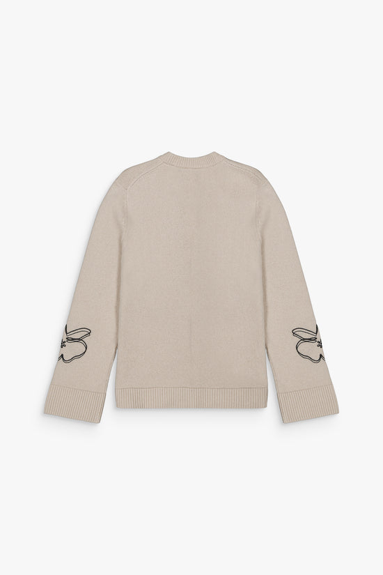 Cardigan béton, maille douce, finitions côtelées et broderies délicates.