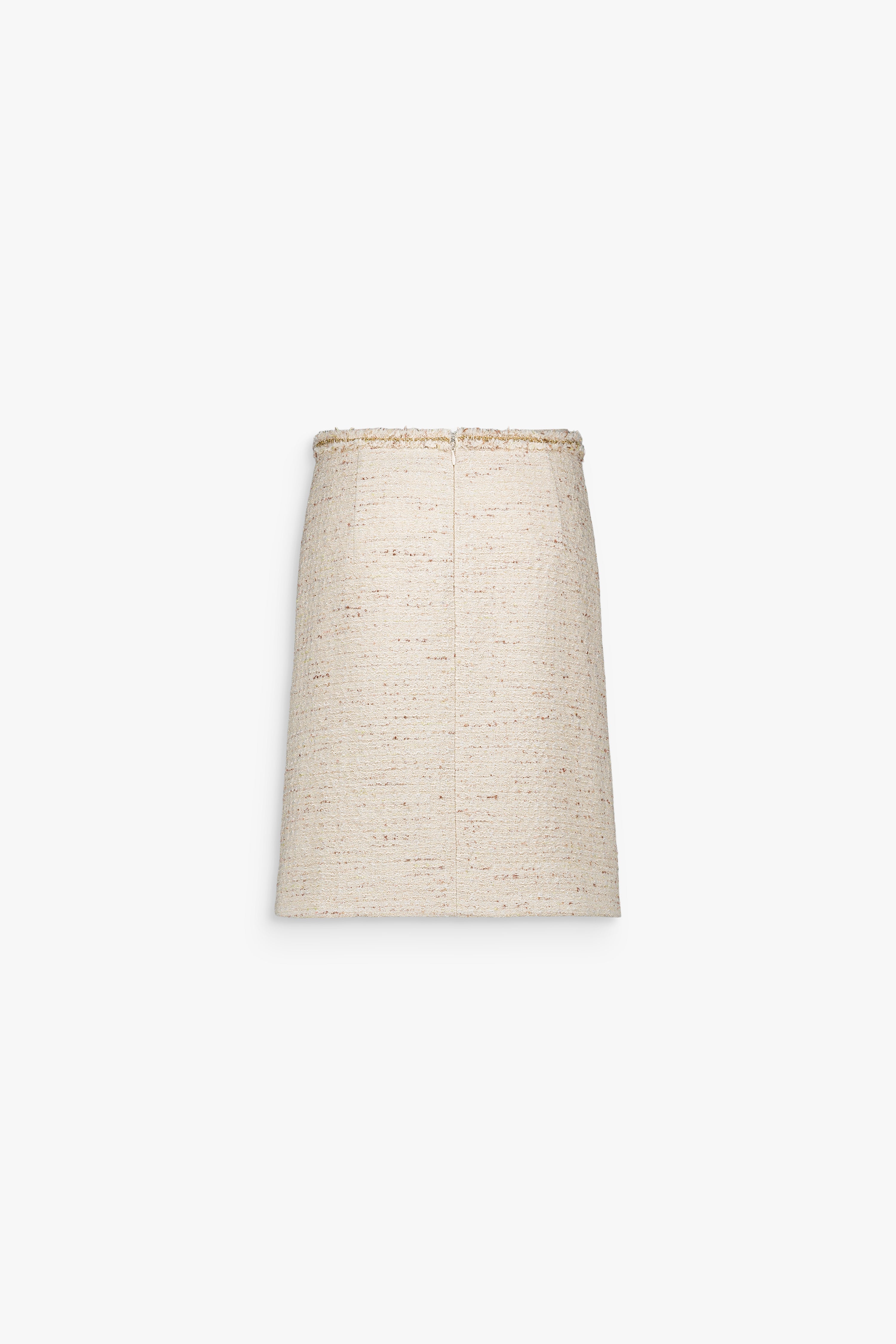 Ceinture montée avec finition nette sur jupe crayon en tweed.