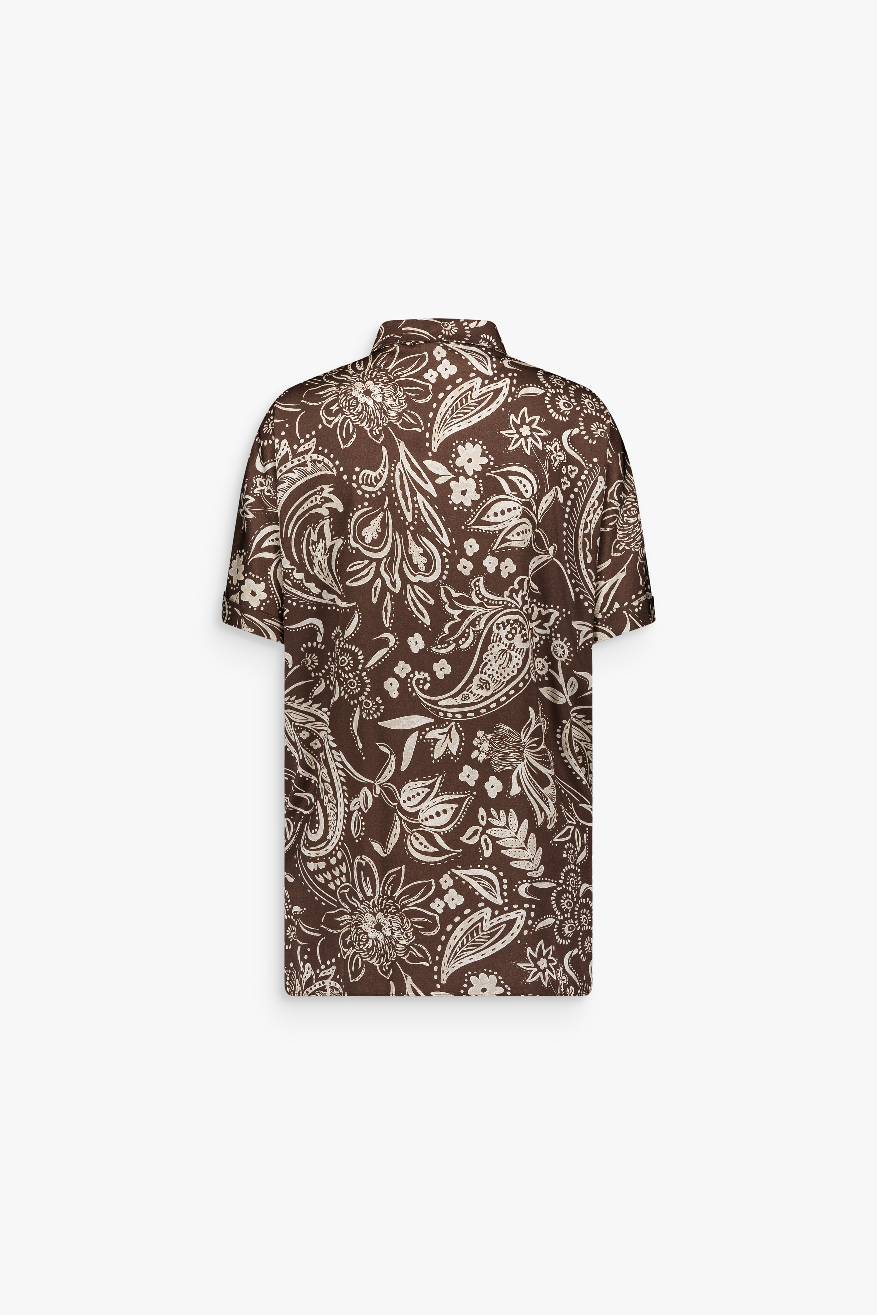 Tunique en soie stretch marron glacé à imprimé floral délicat avec ouvertures latérales.