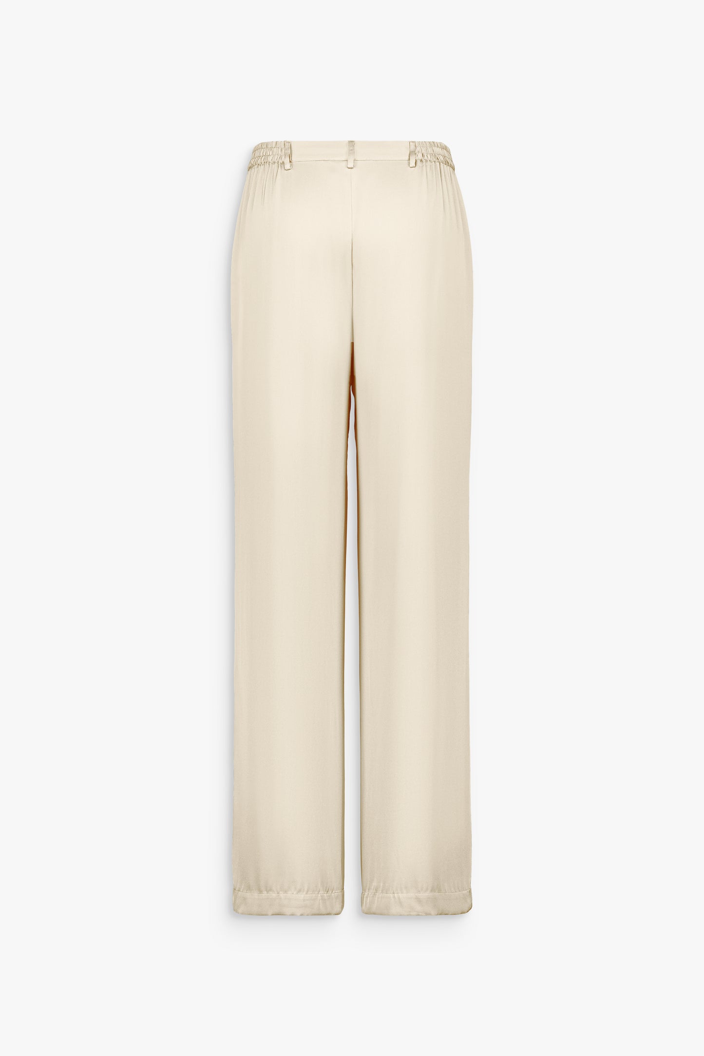 Fronces discrètes devant et dos structurant la taille du pantalon en soie jaune clair.