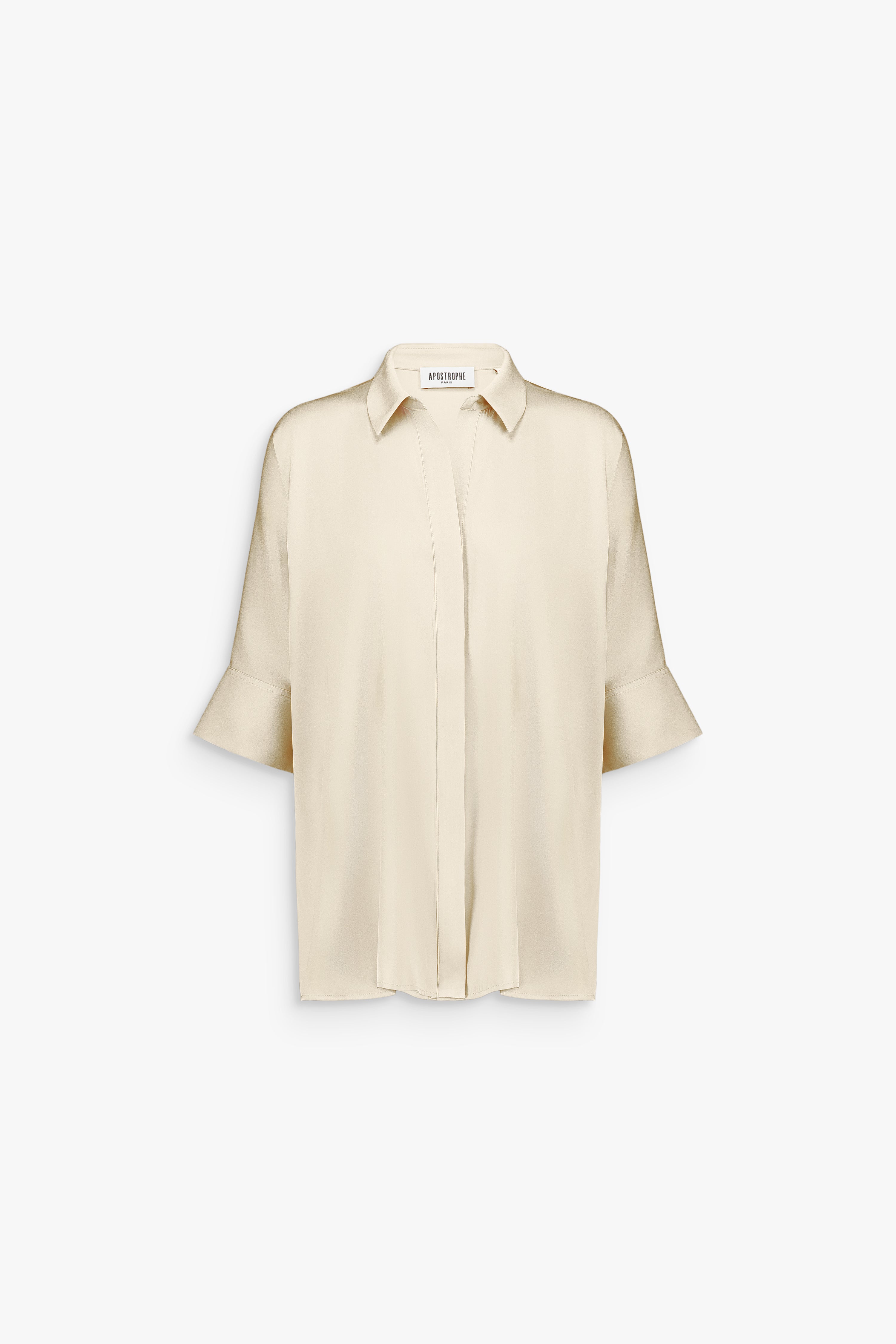 Chemise tunique oversize en soie mélangée jaune clair avec col classique et patte de boutonnage dissimulée.