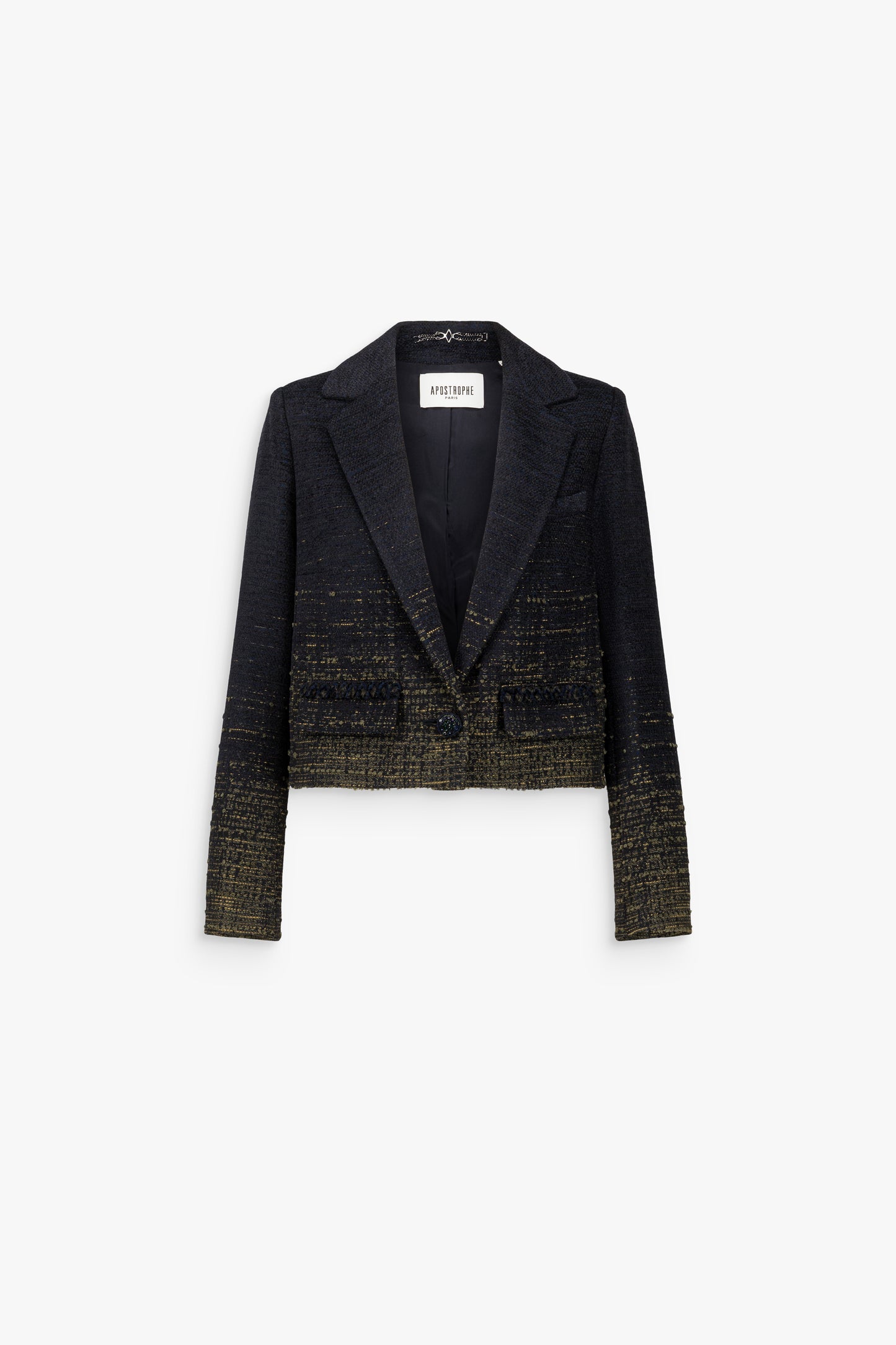 Veste courte et carrée en tweed marine, à grands revers, avec poches passepoilées soulignées de galons tressés.