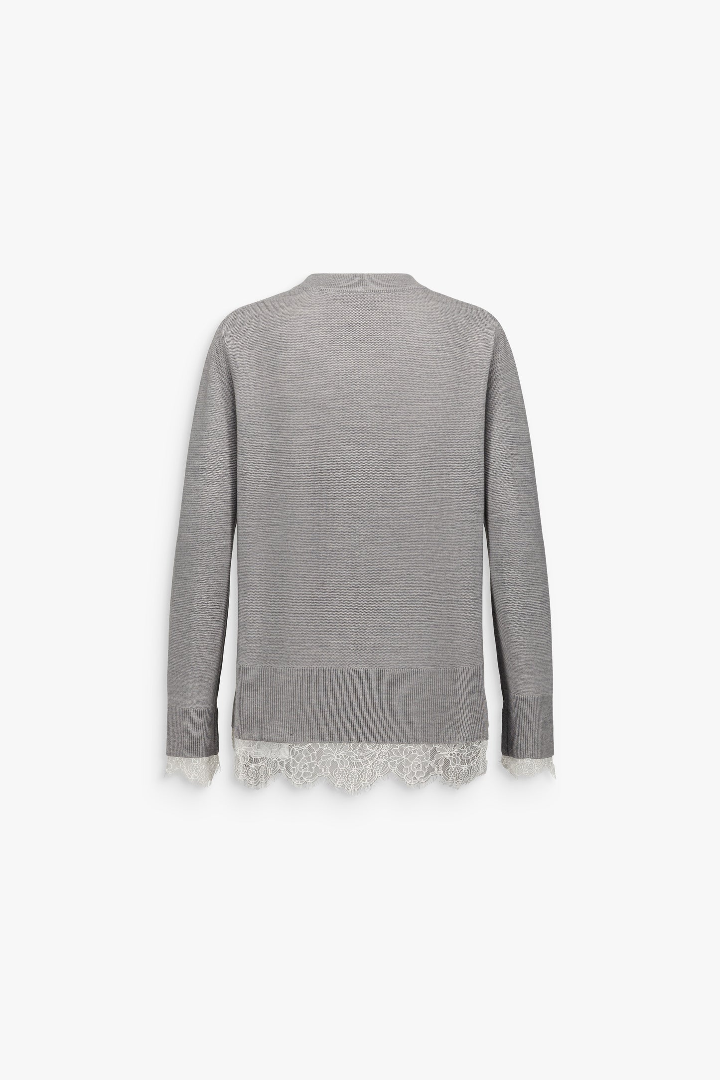 Pull long béton en laine mérinos, à col rond, manches longues et détails en dentelle au bas et aux poignets.