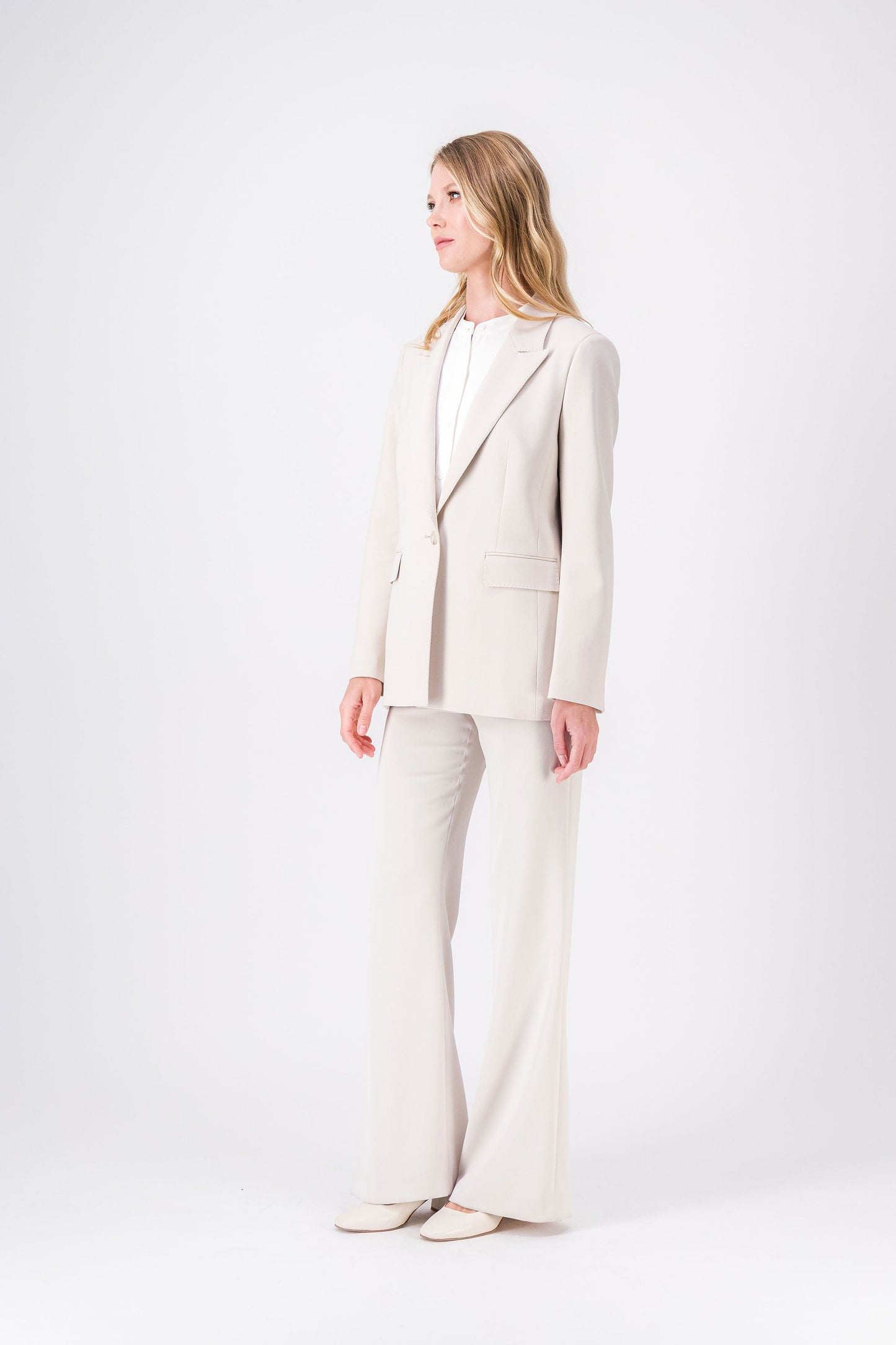 veste à col tailleur, la double boutonnière.