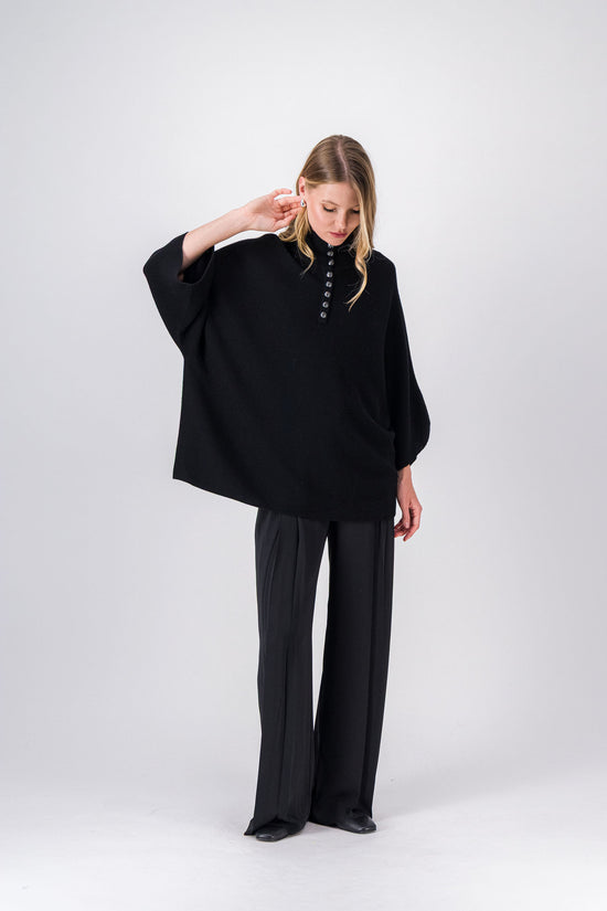 Pull noir avec col roulé