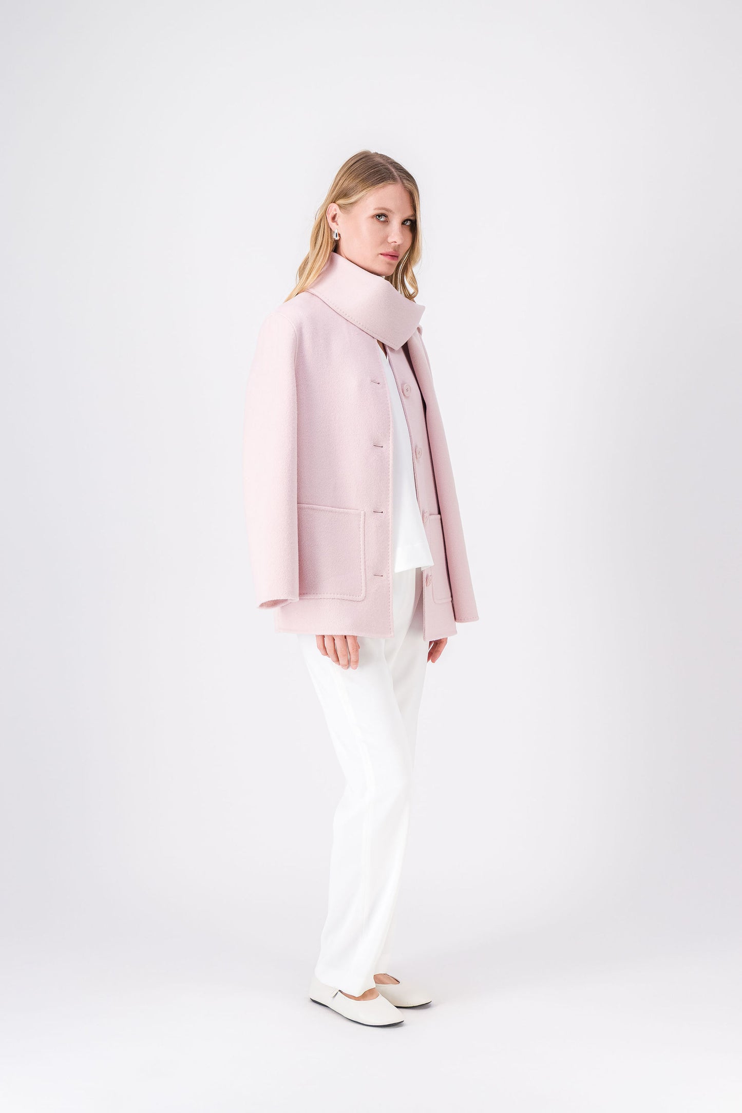 Manteau rose pâle double face, léger et chaud, parfait pour la mi-saison.