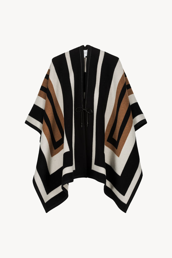 Cape graphique multicolore, confectionnée en cachemire et laine, finitions cuir, style oversize