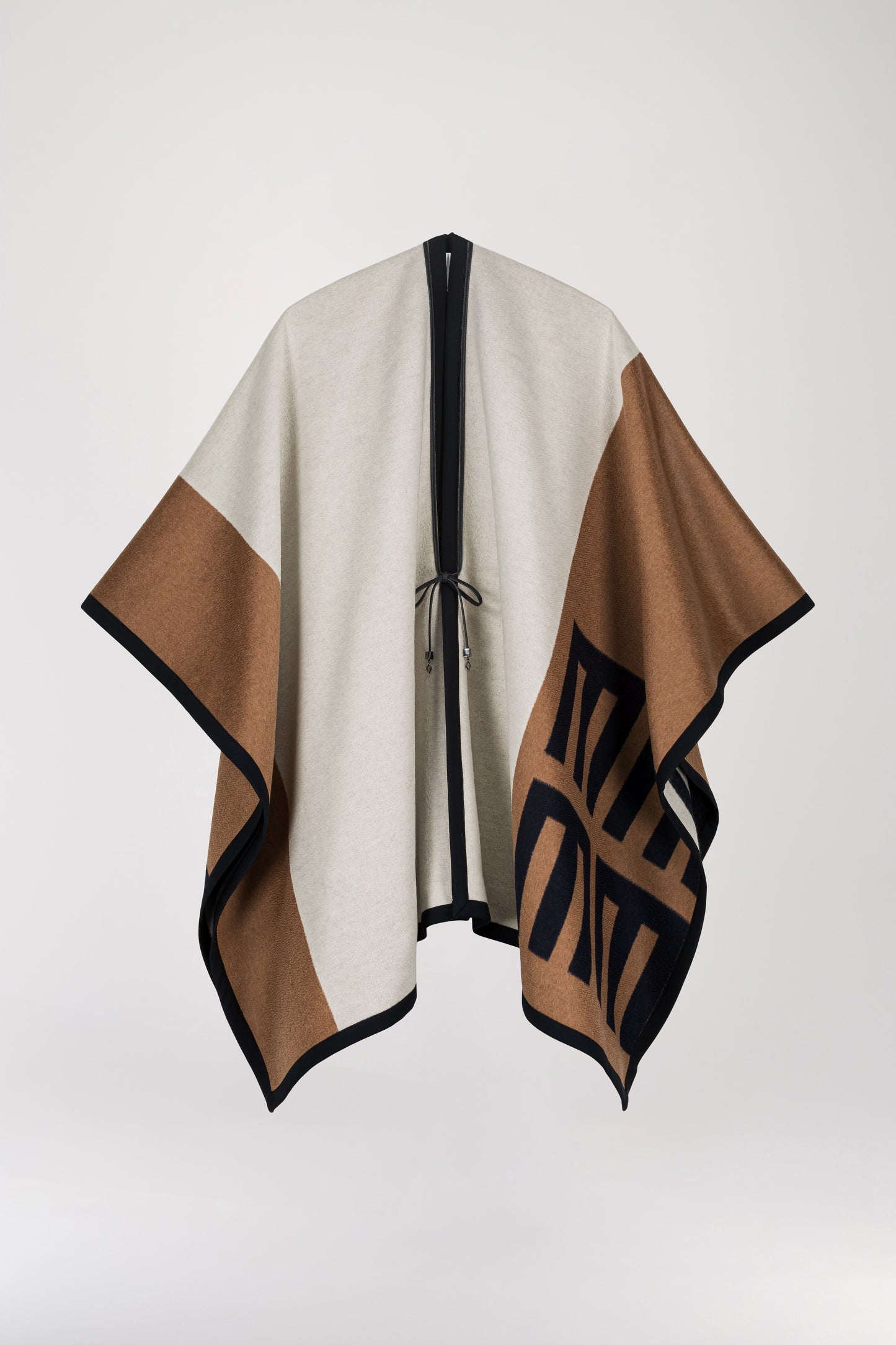 Cashmere and wool poncho cape with ethnic pattern