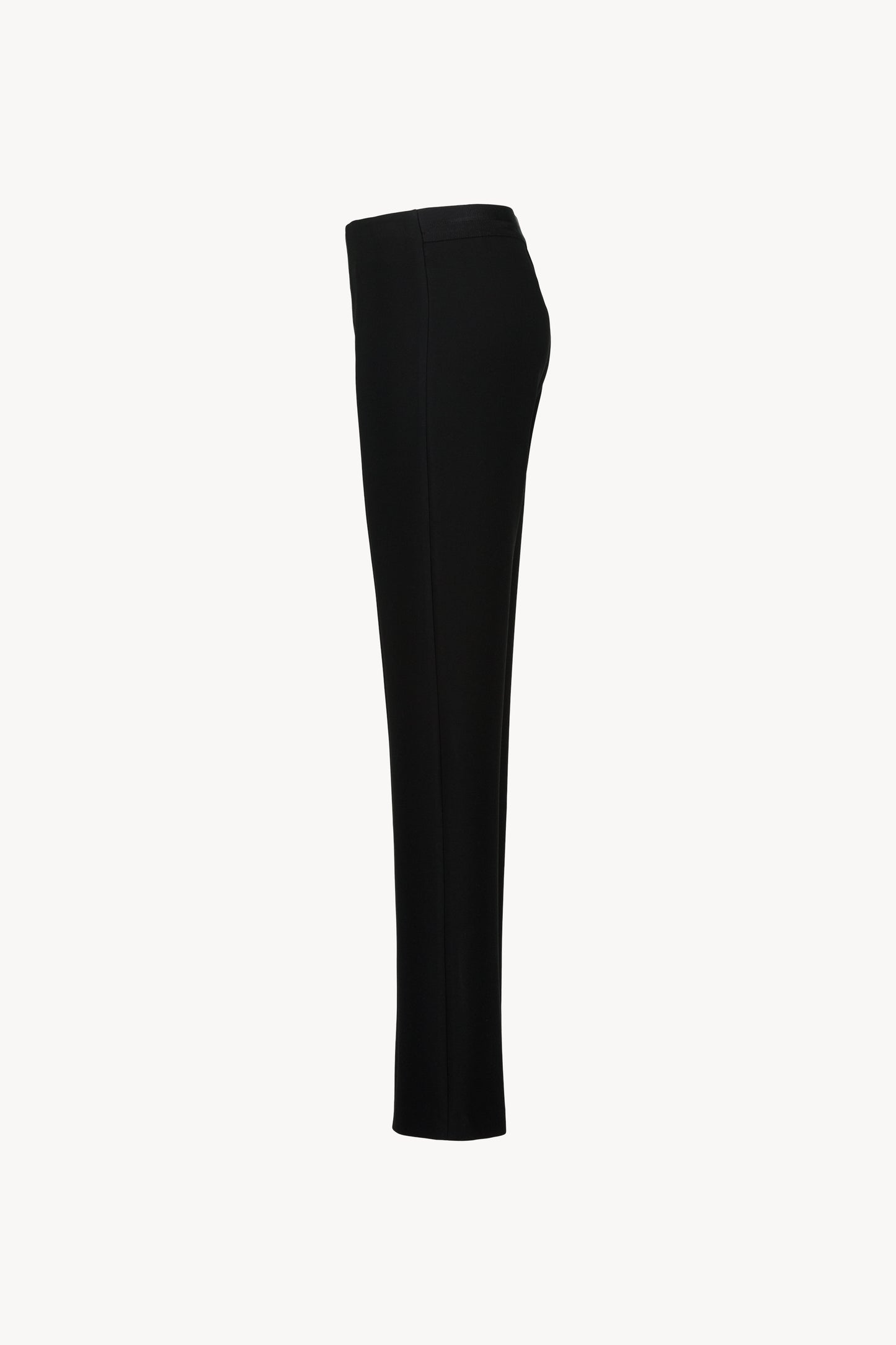 Pantalon noir à coupe droite avec taille élastique et finitions italiennes chic, pour un style moderne et confortable.