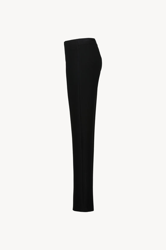 Pantalon noir à coupe droite avec taille élastique et finitions italiennes chic, pour un style moderne et confortable.