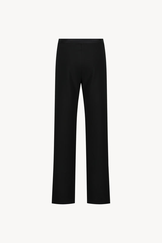 Pantalon noir à coupe droite avec taille élastique et finitions italiennes chic, pour un style moderne et confortable.