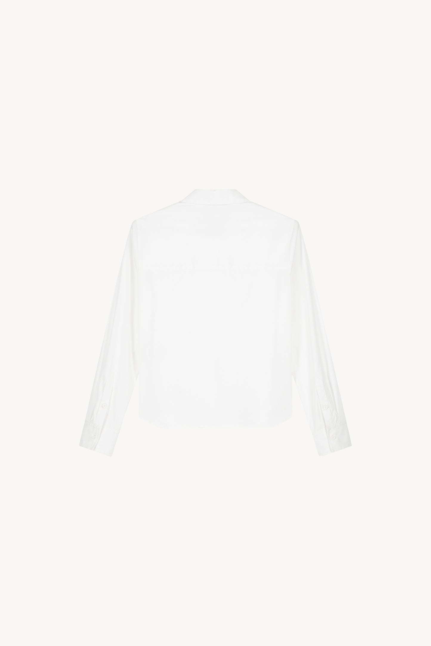 Chemise courte Apostrophe coupe droite avec monogramme brodé ton sur ton, col classique et fermeture boutonnée invisible.