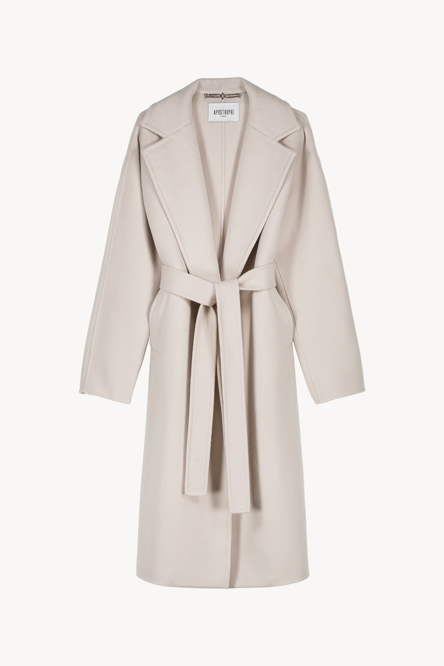 Manteau droit en laine/cachemire, contrasté par des manches et un dos en maille. Fermeture zippée dissimulée à l’avant.