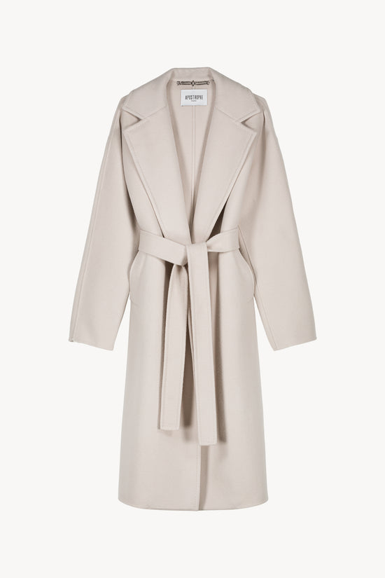 Manteau droit en laine/cachemire, contrasté par des manches et un dos en maille. Fermeture zippée dissimulée à l’avant.