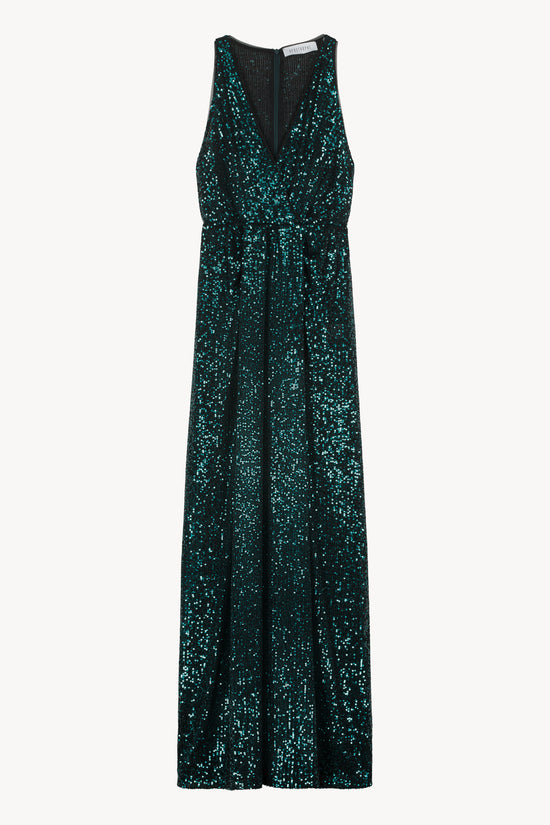 Robe longue à sequins avec décolleté en V et coupe croisée. Fente latérale gauche
