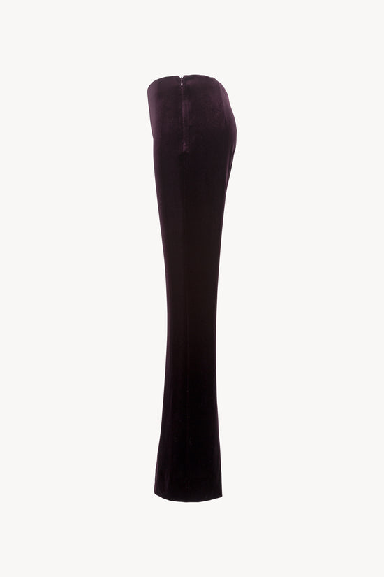 Coupe évasée, ceinture élastique intégrée. Zip invisible sur le côté pour un ajustement optimal.