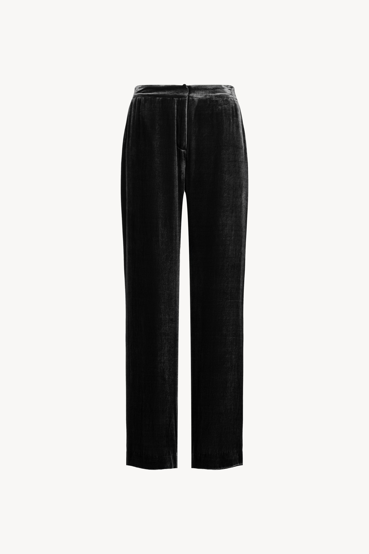 Pantalon large en velours avec poches italiennes et fausses poches passepoilées. Ceinture élastique au dos pour un confort optimal.