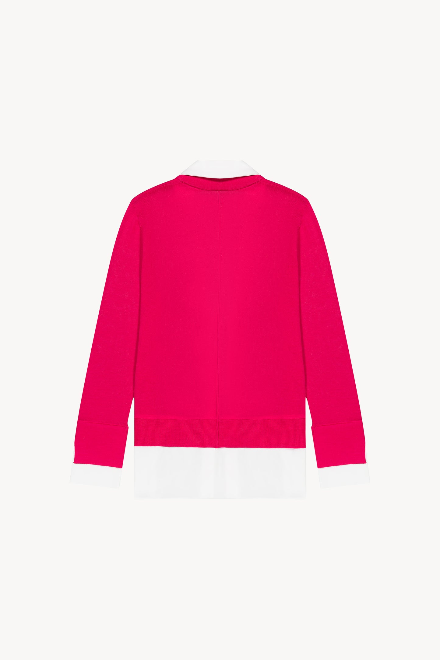Gilet en laine framboise doté de finitions côtelées au col, bas et poignets.
