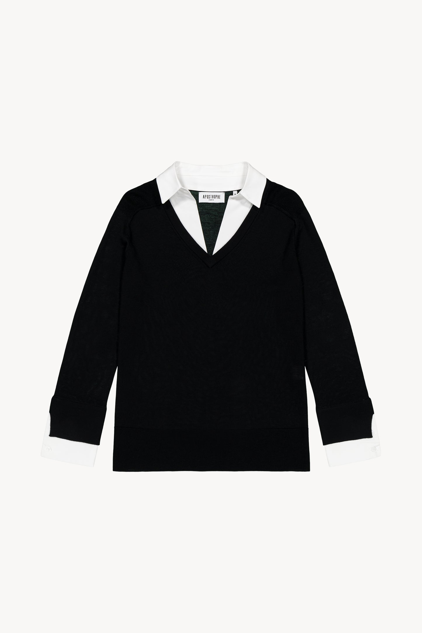 Pull haut de gamme trompe-l'œil, composé de laine fine et orné de lurex.