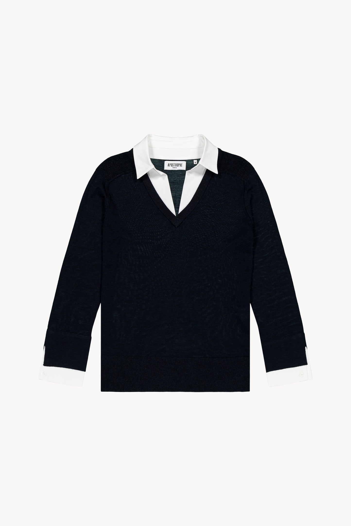 Pull trompe-l'œil à col chemise intégré. Détails lurex sur col et épaules. Fentes latérales. Bas en popeline contrastée.