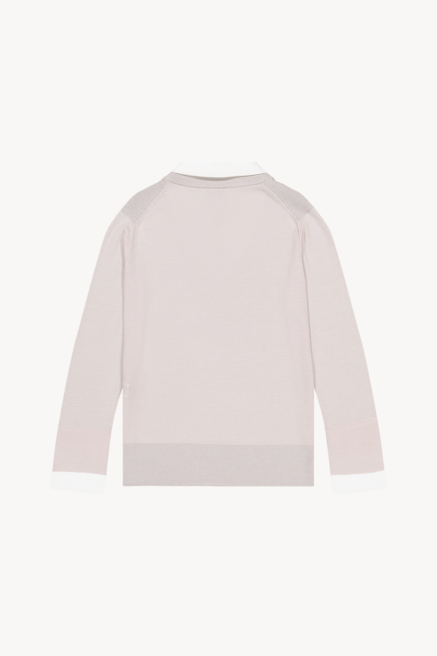 Pull beige a coupe droite et col chemise contrasté en popeline. Lurex discret sur col et épaules. Ouvertures latérales.