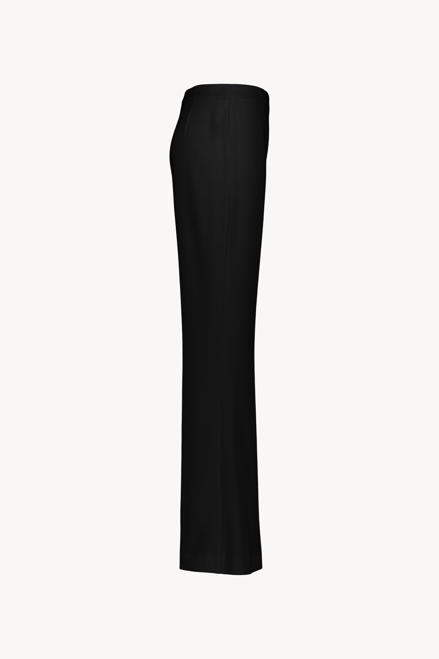 Pantalon fluide à coupe évasée. Taille haute. Fermeture zippée invisible sur le côté.