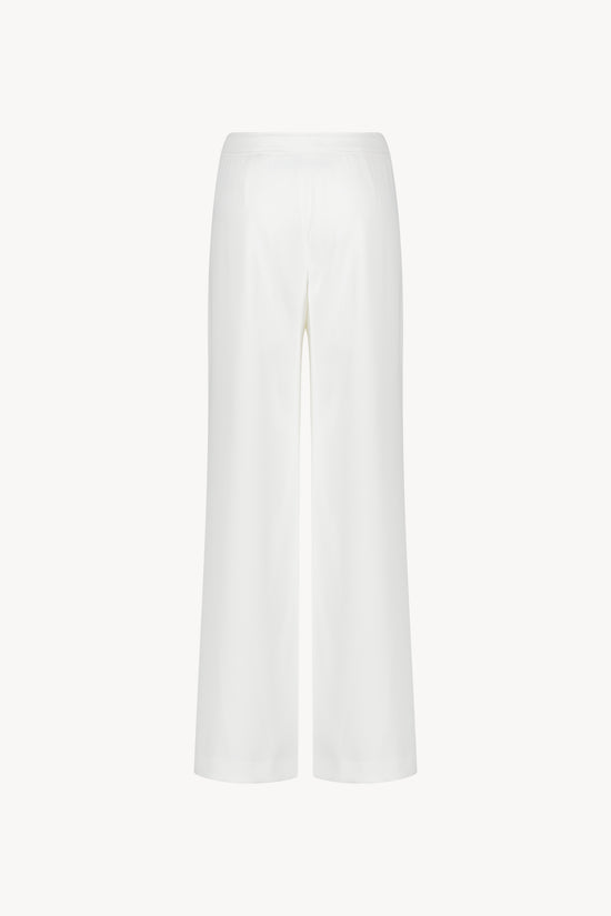 Pantalon taille haute à la coupe évasée, conçu dans un tissu fluide