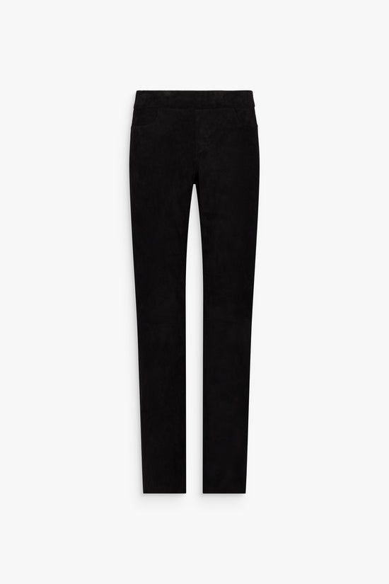 Détail de la taille haute et des finitions sur les leggings noirs en daim.