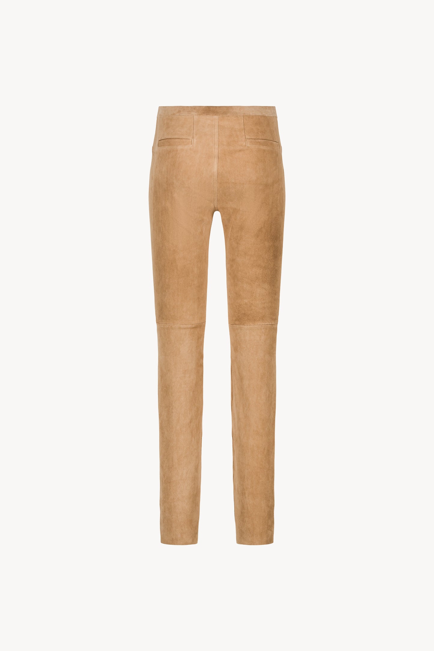 Legging ajusté en daim beige avec fausses poches plaquées avant et arrière. Taille élastique .

