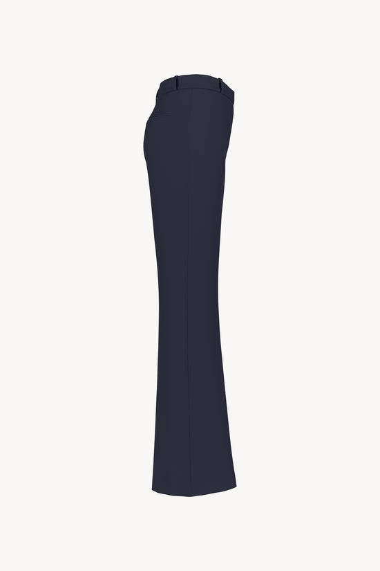 Pantalon fluide marine coupe droit fluide avec des poches italiennes avant et poches passepoilés arrières