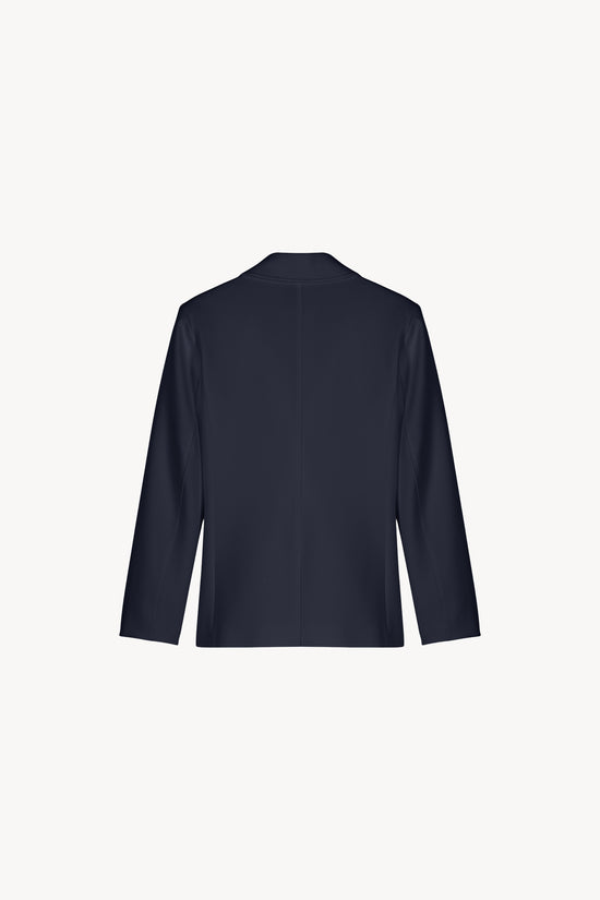 Veste tailleur cintrée marine avec col tailleur et des poches plaquées.