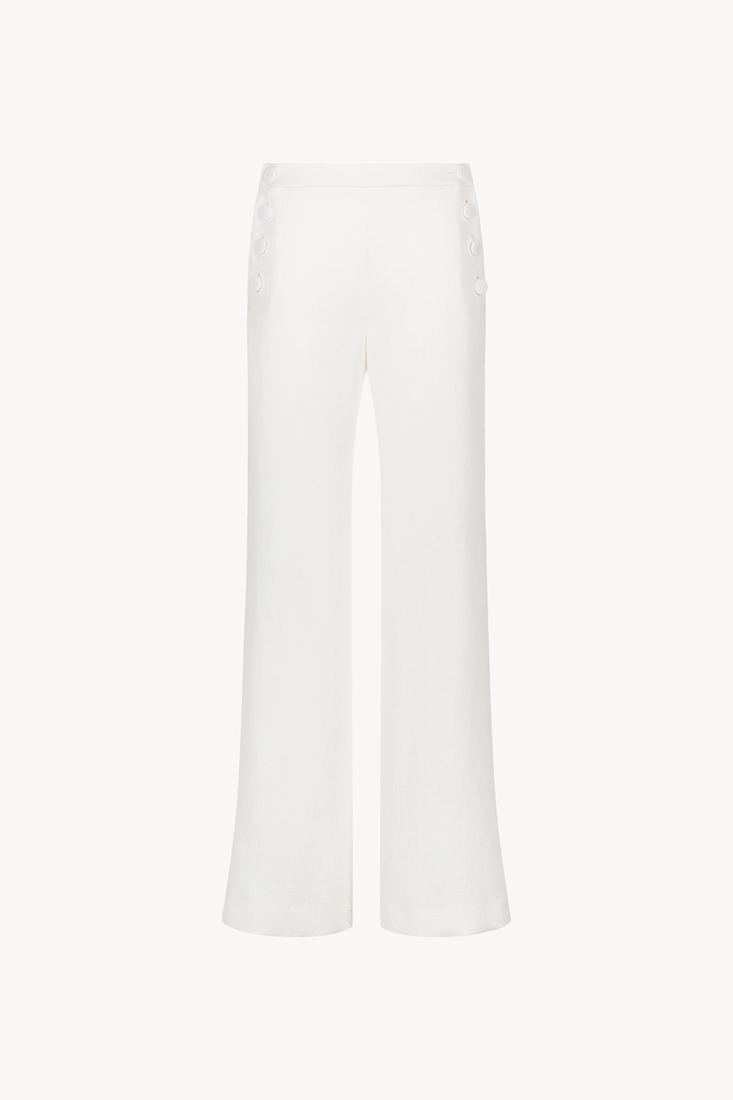 Ce pantalon en lin blanc cassé coupe droite